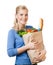 Pretty woman with a bag full of healthy eating