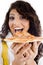 Pretty woman eating delicious pizza