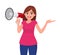 Pretty woman holding a megaphone/loud speaker and showing hand to copy space away. Girl making announcement with megaphone.