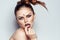 pretty woman posing scorpio sign on forehead cosmetics studio model