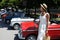 Pretty woman and retro cars