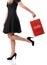 Pretty woman and sale, detail photo, female legs with sale bags