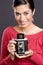 Pretty woman take photo vintage viewfinder camera