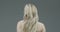 Pretty young blond female with long hair take off scrunchie, let down hair during everyday beauty routine, back view