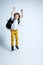 Pretty young boy in casual clothes on white studio background