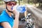 Pretty, young female biker outdoors on her mountain bike