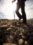 Pretty, young female hiker going uphill