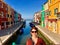 A pretty young female tourist poses on a bridge for a photo with the old colourful historic homes and canal of Burano, Italy in th