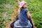 Pretty young girl and her dad doing an elephant trek in Khao Sok National Park in Thailand