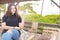 Pretty young woman in beautiful private terrace at the beach front