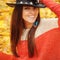 Pretty young woman fashion close up portrait, leather hat and ha