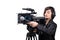 Pretty young woman  journalist with microphone with video camera on white