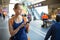 Pretty, young woman in a trainstation, waiting for her train