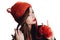 Pretty young woman wearing a hand knitted red hat on white background. Isolated. Beautiful girl in with Ear flap.