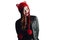 Pretty young woman wearing a hand knitted red hat on white background. Isolated. Beautiful girl in with Ear flap.