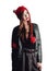 Pretty young woman wearing a hand knitted red hat on white background. Isolated. Beautiful girl in with Ear flap.