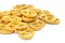 Pretzel with many small cookies scattered on a white background. Traditional food for Oktoberfest - salt appetizer pretzels on a