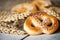 Pretzels with sesame seeds on wooden table