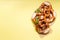 Pretzels on yellow background copy space, german traditional food