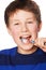 Preventing cavities. Portrait of a young boy brushing his teeth.