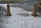 preventing vehicles from entering the pedestrian zone  cycle path in winter. by placing a large boulder in the