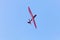PRIBRAM, CZECH REPUBLIC - 29 MAY 2010: Unpowered red glider aerobatics shows over the airport on a beautiful sunny day.