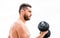 Price of greatness is responsibility. Dumbbell exercise gym. Muscular man exercising with dumbbell. Sportsman with