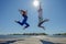 They are pricked into the air. At the pier by the sea. couple outdoors. mixed pair of lovers, African man and European