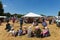 Priddy Folk Festival Somerset with people sitting watching a show