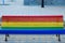 Pride flag painted in a public bench