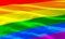 Pride rainbow flag closeup view background for LGBTQIA+ Pride month, sexuality freedom, love diversity celebration and the fight