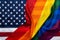 Pride rainbow lgbt gay flag over american flag . Equality diversity freedom