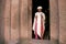 Priest at ancient rock hewn churches of lalibela ethiopia
