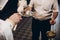 Priest blessing golden wedding rings on plate in church before w