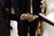 Priest blessing luxury wedding rings in the old church