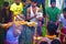 A priest bringing the holy water for the worship of Lord Shiva. the villagers enjoys the programme