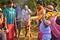 A priest bringing the holy water for the worship of Lord Shiva. the villagers enjoys the programme