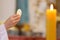 Priest gives holy communion to faithful