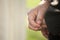 Priest holding two wedding rings close up