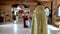 Priest praying. Christianity ceremony. Interior wooden Orthodox church of Peter and Fevronia: Gomel  Belarus - 08.15.2020