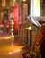 Priest reading Bible in Orthodox church interior