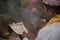 Priest reading prayers during hindu ceremony