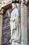 Priest statue on the Portal of the Last Judgment on the main Cathedral Notre Dame de Paris