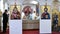 Priests praying in the altar of the Romanian Orthodox Church