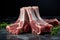 Primal arrangement Uncooked lamb ribs placed on a natural stone tabletop