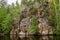 Primal stony shore of a calm lake in Karelia