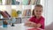 Primary school girl sitting at desk