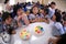 Primary school students organize birthday parties in the school canteen.