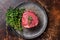 Prime Fillet Mignon Beef steak, Dry aged raw tenderloin meat. Dark background. Top view