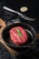 Prime Fillet Mignon Beef steak ready for cooking, Dry aged raw tenderloin meat. Black background. Top view